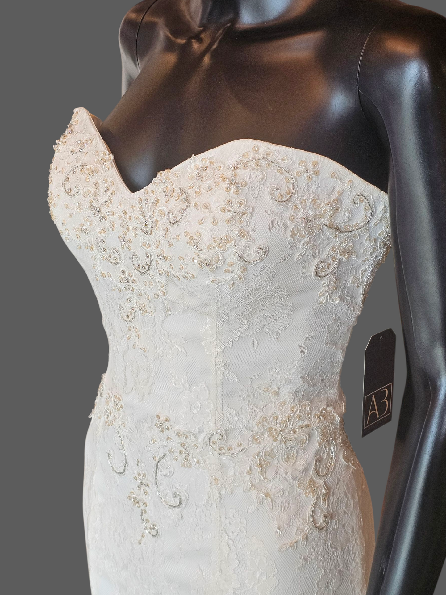 Ivory Lace Strapless Sweetheart Fit/Flare Verticle Ruffle Wedding Gown - Casablanca